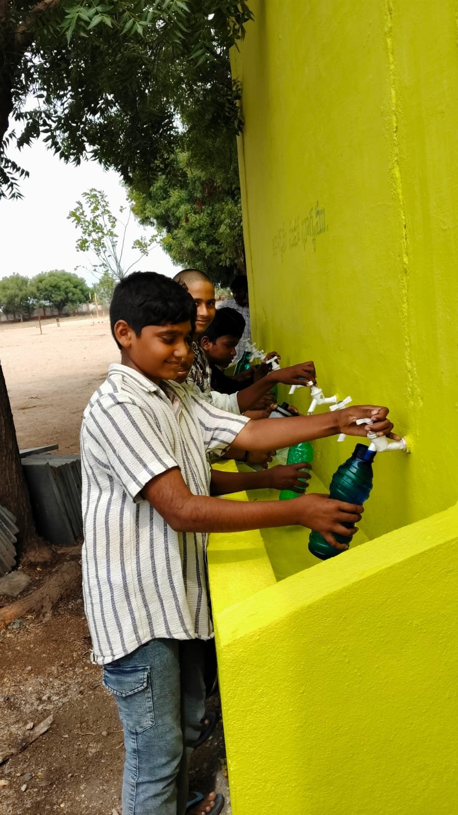 Student water tap system in use